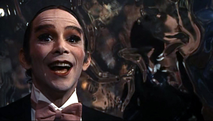 Emcee farewells us as the Nazi filled audience takes shape in the mirror beside him